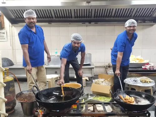 Authentic Andhra cooks preparing traditional food for catering events
