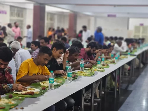 Baby shower catering service in Bangalore serving traditional vegetarian meals on banana leaf for guests