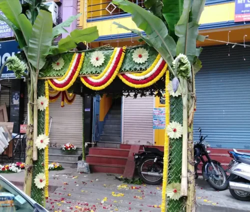 Fresh flower chappara decoration for housewarming ceremony entrance