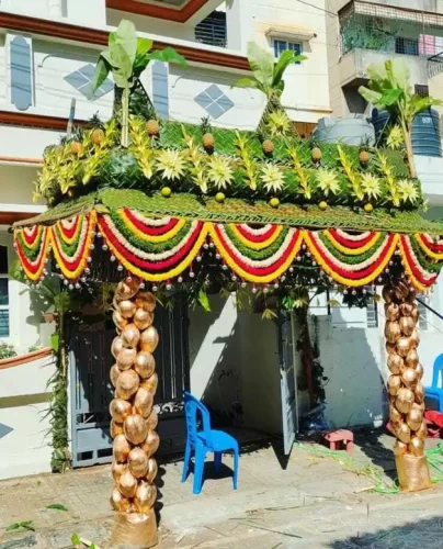 Chappara doorway flower decoration with fresh flowers for griha pravesh