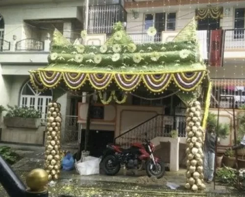 Elegant chappara floral decoration for housewarming function using fresh flowers