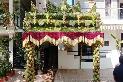 Mandap style chappara flower decoration with fresh flowers for griha pravesh
