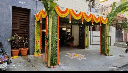 Marigold flower chappara decoration for traditional house warming ceremony