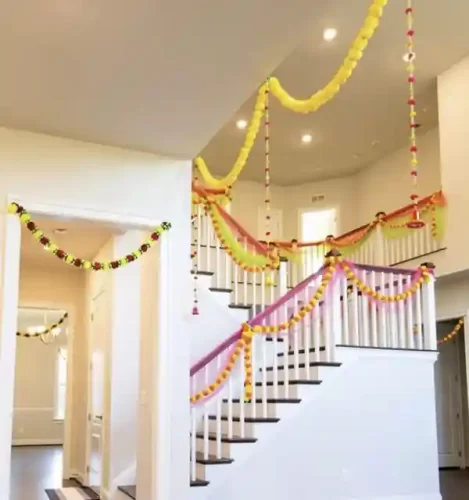 Elegant griha pravesh balcony floral decor with yellow and white flowers