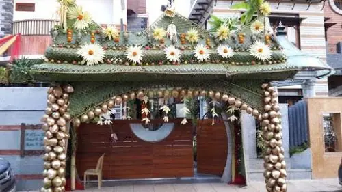 Elegant chappara decoration with fresh flowers and banana leaves for gruhapravesham in Bangalore