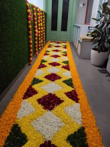 Flower pathway decoration for gruhapravesham entrance