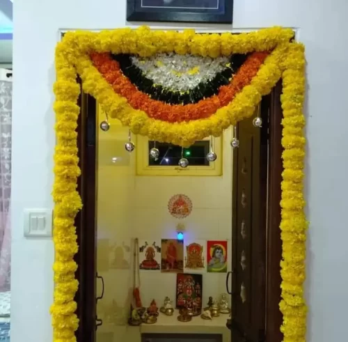 Puja room flower arrangements for griha pravesh ceremony in Bangalore