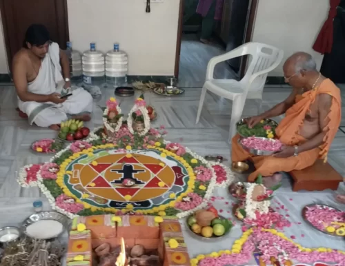 Griha pravesh purohit performing sacred rituals at new home