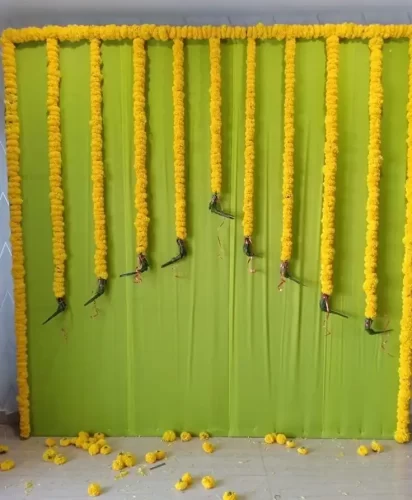 Traditional gruhapravesha pooja mandap decorated with marigold and jasmine flowers in Bangalore
