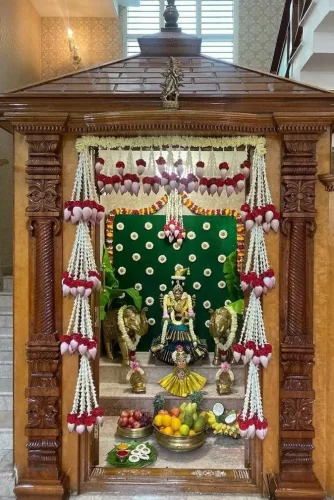 Traditional gruhapravesha puja room flower decoration with jasmine and marigold in Bangalore home