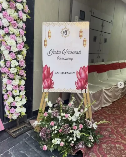 Flower arrangement welcome board for gruhapravesha