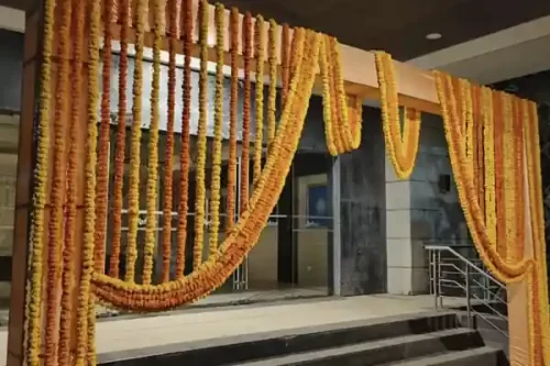 Balcony flower garland decoration for gruhapravesham ceremony