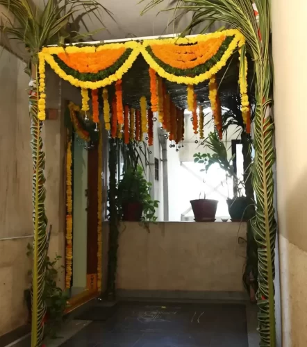 Gruhapravesham chappara flower decoration for apartment entrance in Bangalore