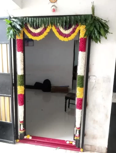 Main door flower decoration for gruhapravesham in Bangalore