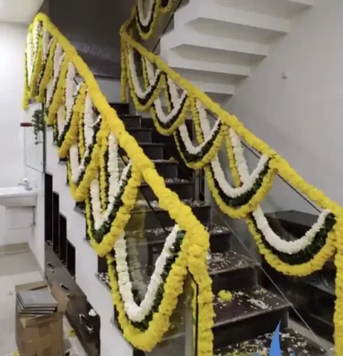 Staircase and railing flower decoration for gruhapravesham