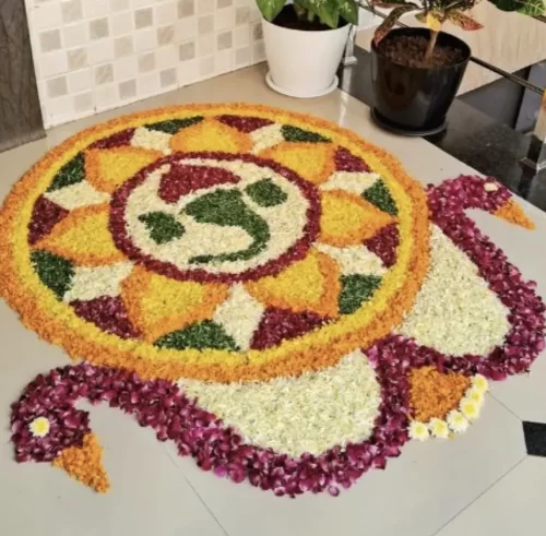 Traditional flower rangoli pattern for gruhapravesham