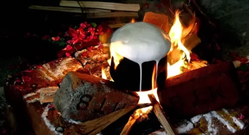 Milk boiling ritual performed during house warming ceremony in Bangalore