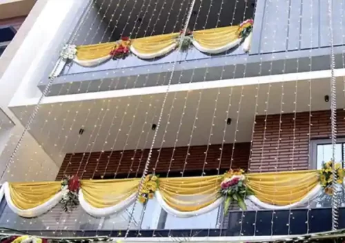 Housewarming balcony floral decoration with fabric and fresh flowers