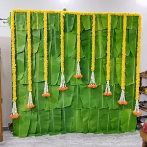 Housewarming pooja room flower decoration with jasmine and marigold garlands
