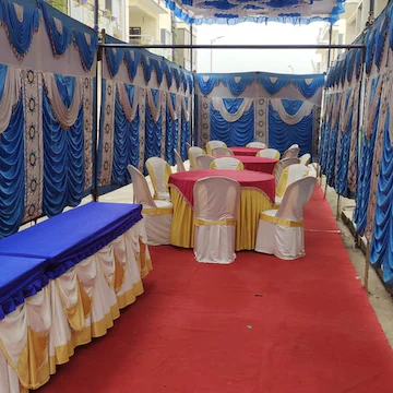 Round table seating setup for gruhapravesha function in Bangalore