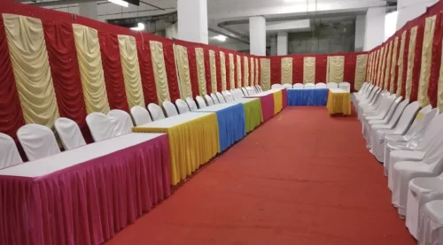 Shamiyana table and chair arrangement for housewarming ceremony in Bangalore