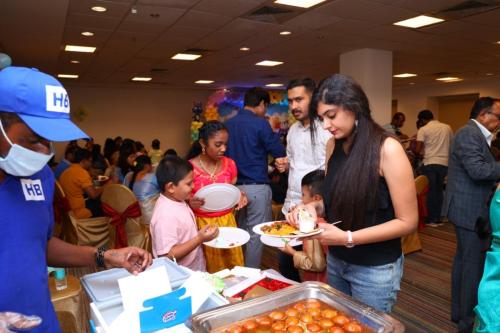 Andhra-style-caterers-serving-icecreams-for-guest-in-birthday-event-Bangalore