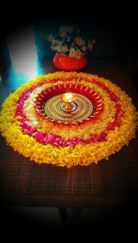 Diya rangoli decoration for house warming ceremony