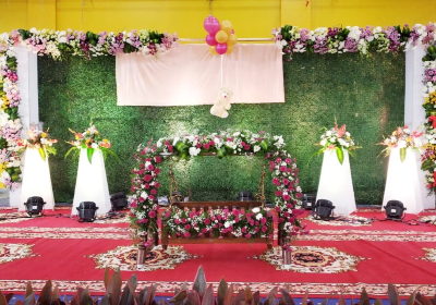 Grass backdrop naming ceremony floral decor organisers Bangalore