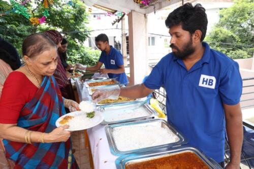 Mohan from Hiibangalore catering serving food to the guests