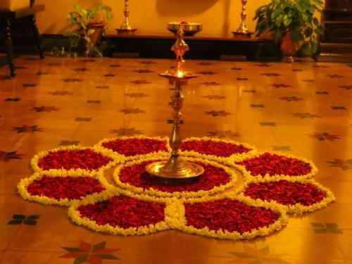 Rangoli with flowers for gruha pravesha