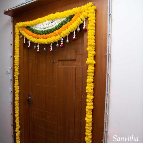 simple marigold floral decor for house waming bangalore